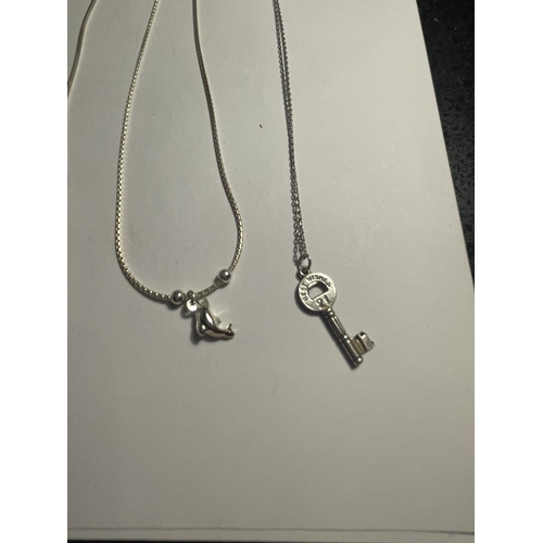 624 - FOUR SILVER NECKLACES WITH PENDANTS