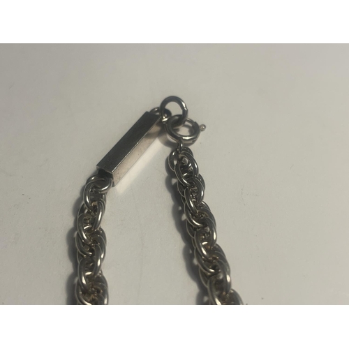 626 - A SILVER BLOCK AND CHAIN BRACELET