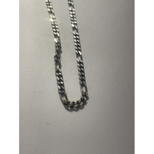 634 - TWO SILVER FLAT LINK CHAINS