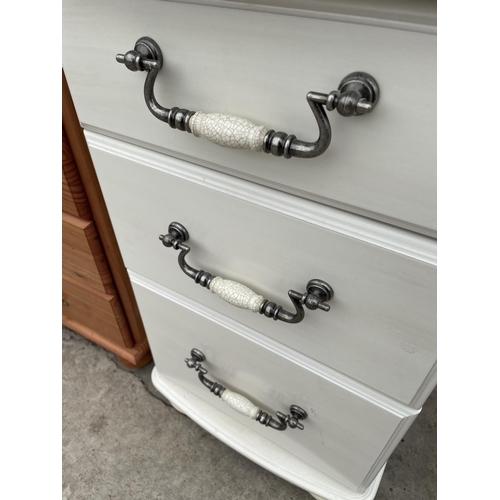 2783 - A WHITE BEDSIDE CHEST OF THREE DRAWERS