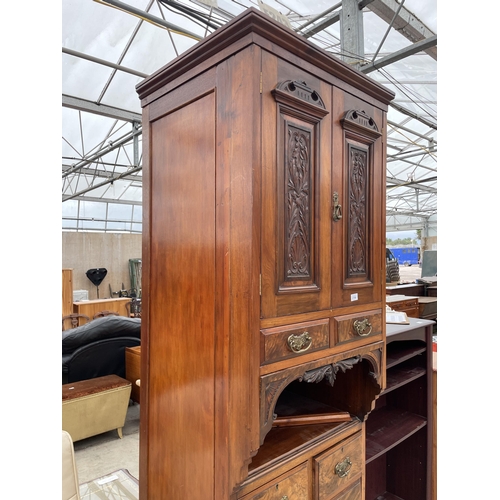 2786 - AN EARLY 20TH CENTURY WALNUT AND MAHOGANY CABINET WITH TWO UPPER DOORS AND DRAWERS AND TWO SHORT AND... 