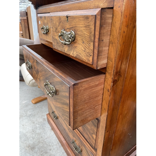 2786 - AN EARLY 20TH CENTURY WALNUT AND MAHOGANY CABINET WITH TWO UPPER DOORS AND DRAWERS AND TWO SHORT AND... 