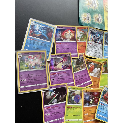 103 - A TRAINER BOX OF ASSORTED POKEMON CARDS, HOLOS, TOKENS ETC