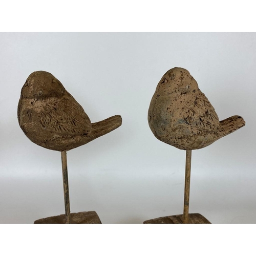 108 - A PAIR OF DECORATIVE STONE BIRD FIGURES ON PLINTH BASES, HEIGHT 24CM