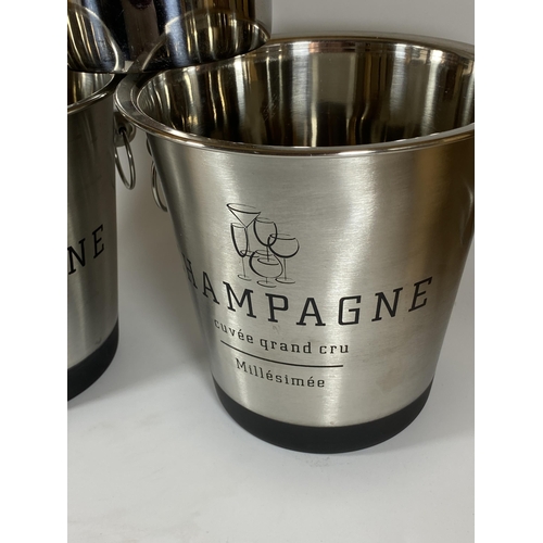 109 - A PAIR OF CHROME EFFECT CHAMPAGNE BUCKETS AND FURTHER STAINLESS STEEL BUCKET (3)