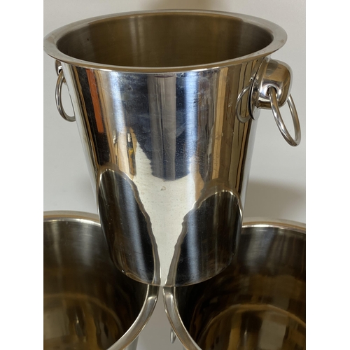 109 - A PAIR OF CHROME EFFECT CHAMPAGNE BUCKETS AND FURTHER STAINLESS STEEL BUCKET (3)