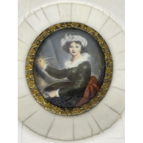 113 - AN ANTIQUE PORTRAIT MINIATURE OF A LADY PAINTING WITH GILT BORDER