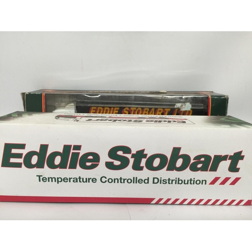 336 - FOUR BOXED EDDIE STOBART TRUCKS, 3 ATLAS AND 1 CORGI