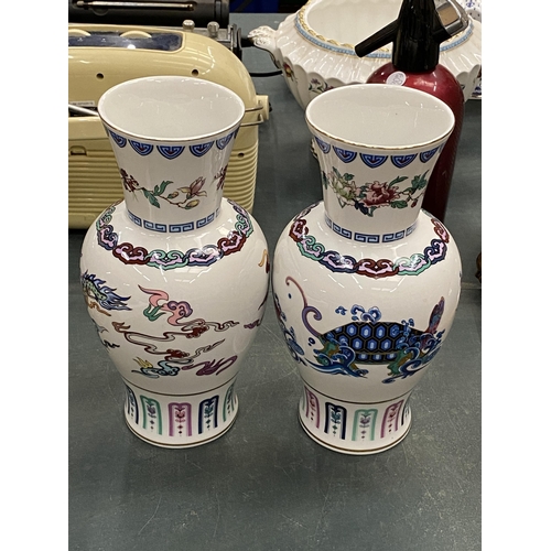 132 - TWO ORIENTAL STYLE VASES, 'THE DANCE OF THE CELESTIAL DRAGON' AND 'THE JOURNEY OF THE HEAVENLY TORTO... 