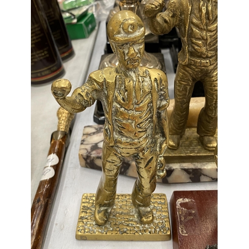 140 - FOUR BRASS FIGURES OF MINERS, ONE ON A MARBLE PLINTH