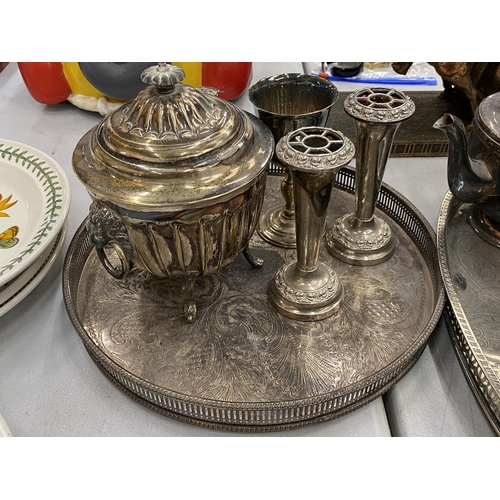 144 - A LARGE QUANTITY OF SILVER PLATED ITEMS TO INCLUDE GALLERIED TRAYS, A ROSE BOWL, TEAPOTS, VASES, CAN... 