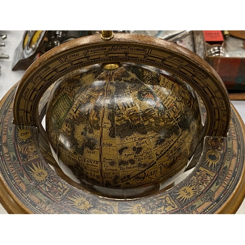 178 - AN ITALIAN WOODEN ROTATING WORLD GLOBE WITH ASTROLOGICAL SIGNS TO THE SIDE, HEIGHT APPROX 23CM