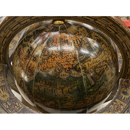 178 - AN ITALIAN WOODEN ROTATING WORLD GLOBE WITH ASTROLOGICAL SIGNS TO THE SIDE, HEIGHT APPROX 23CM