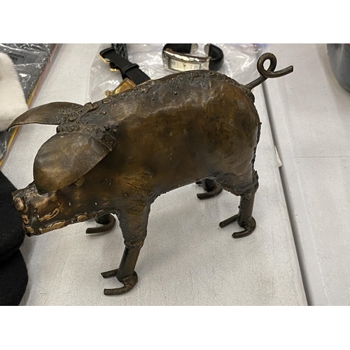 187 - A HAND SCULPTED METAL PIG, HEIGHT 12CM