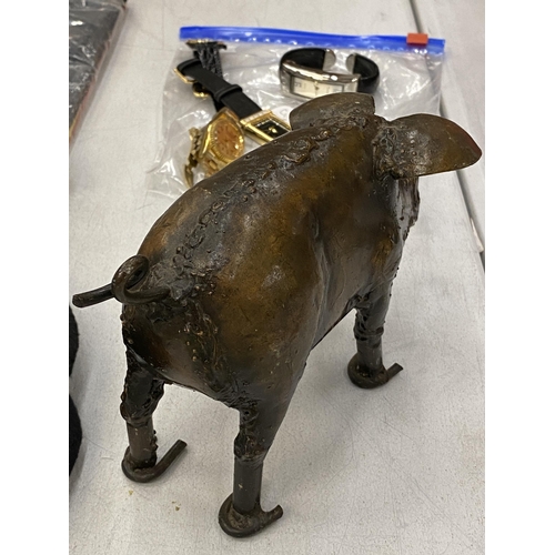 187 - A HAND SCULPTED METAL PIG, HEIGHT 12CM