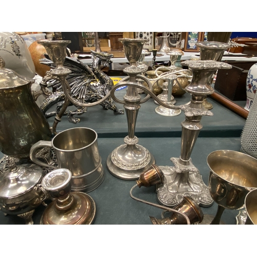 198 - A LARGE QUANTITY OF VINTAGE SILVER PLATED ITEMS TO INCLUDE GALLERIED TRAYS, GOBLETS, CANDLEABRAS, A ... 