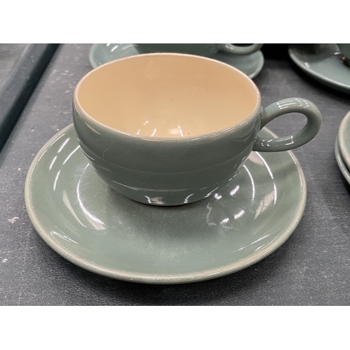 199 - A QUANTITY OF DENBY CUPS AND SAUCERS IN GREEN