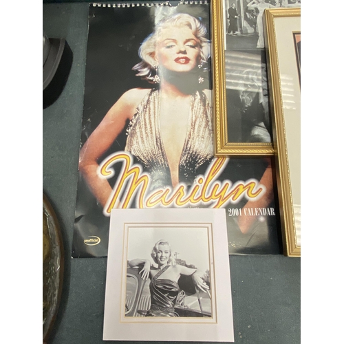 201 - A LARGE COLLECTION OF MARILYN MONROE MEMORABILIA TO INCLUDE A FRAMED FILM CELL AND FRAMED PHOTO WITH... 