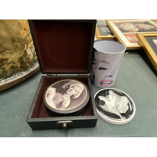 201 - A LARGE COLLECTION OF MARILYN MONROE MEMORABILIA TO INCLUDE A FRAMED FILM CELL AND FRAMED PHOTO WITH... 