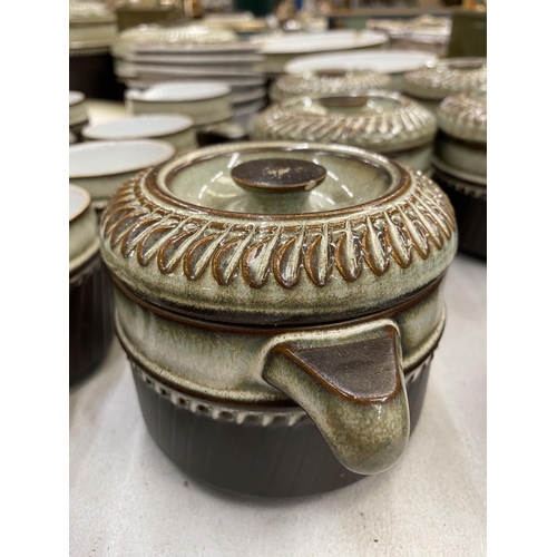 215 - A LARGE QUANTITY OF DENBY STONEWARE DINNER ITEMS TO INCLUDE SERVING TUREENS, SMALLER LIDDED POTS, BO... 