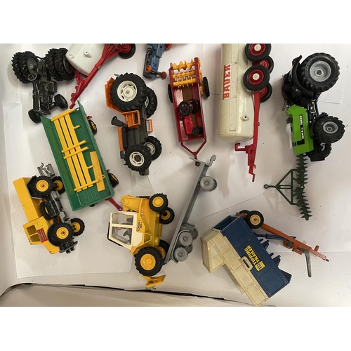 343 - A COLLECTION OF BRITAINS FARM VEHICLES TO INCLUDE TRACTORS, TRAILERS, MACHINES, ETC