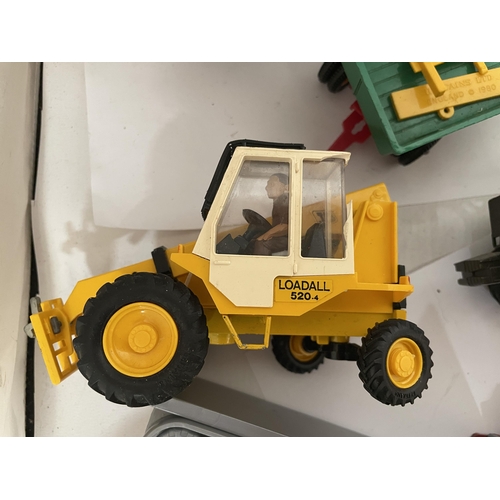 343 - A COLLECTION OF BRITAINS FARM VEHICLES TO INCLUDE TRACTORS, TRAILERS, MACHINES, ETC