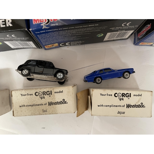 344 - TWELVE BOXED AND SIX UNBOXED DIE-CAST CARS TO INCLUDE MAISTO