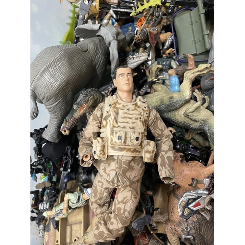 396 - A LARGE MIXED LOT TO INCLUDE PLASTIC DRAGONS, ANIMALS, SOLDIERS, ACTION MAN, CARS, ETC.,