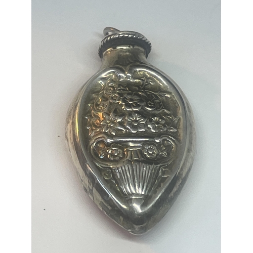 94 - A DECORATIVE MARKED SILVER MOUNTED BOTTLE PENDANT