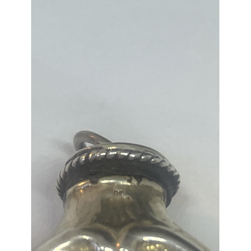 94 - A DECORATIVE MARKED SILVER MOUNTED BOTTLE PENDANT