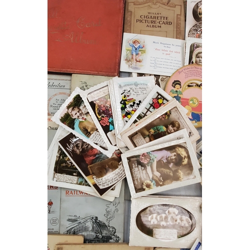 267 - A COLLECTION OF VINTAGE CIGARETTE CARD ALBUMS TOGETHER WITH LOOSE EXAMPLES