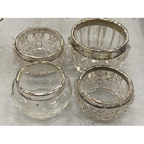 228 - FOUR HALLMARKED SILVER RIMMED POTS