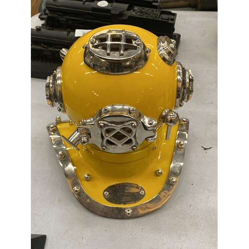 232 - A CHROME AND YELLOW DIVERS HELMET