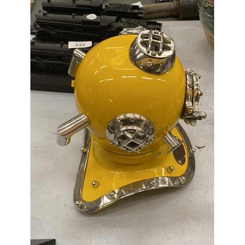 232 - A CHROME AND YELLOW DIVERS HELMET