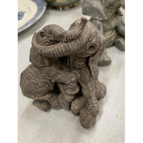 293 - A COLLECTION OF RESIN ELEPHANTS - 8 IN TOTAL TO INCLUDE TUSKERS, RUFF & TUMBLE, HERD, ETC.,