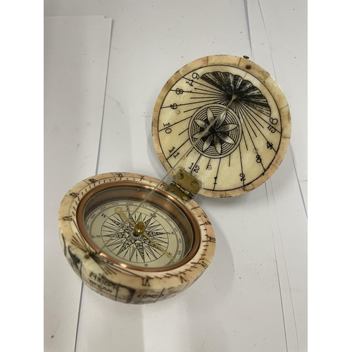 14 - A VINTAGE BONE GLOBE COMPASS