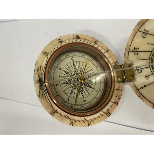 14 - A VINTAGE BONE GLOBE COMPASS