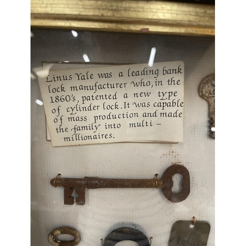 16 - A FRAMED LOCK AND KEY DISPLAY