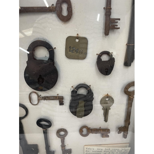 16 - A FRAMED LOCK AND KEY DISPLAY