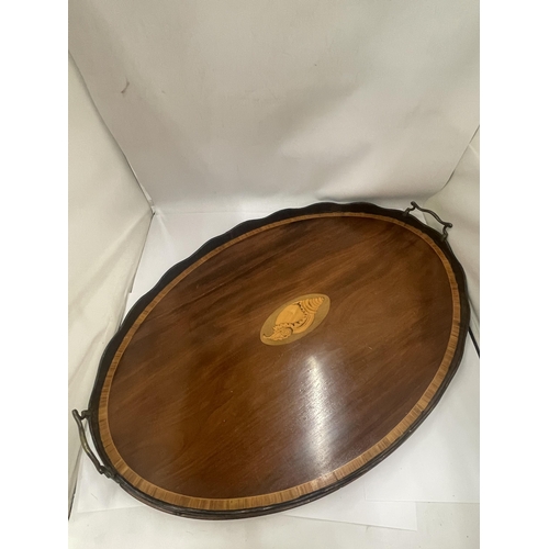 24 - AN EDWARDIAN INLAID OVAL DRINKS TRAY, LENGTH 69CM