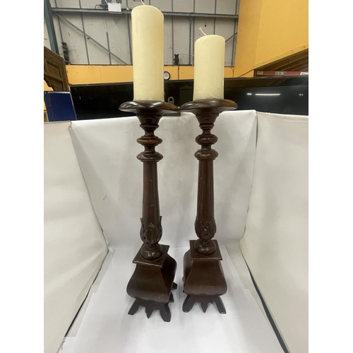 30 - A PAIR OF LARGE GOTHIC PUGIN STYLE CANDLESTICKS, HEIGHT 62CM