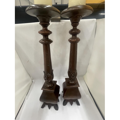 30 - A PAIR OF LARGE GOTHIC PUGIN STYLE CANDLESTICKS, HEIGHT 62CM