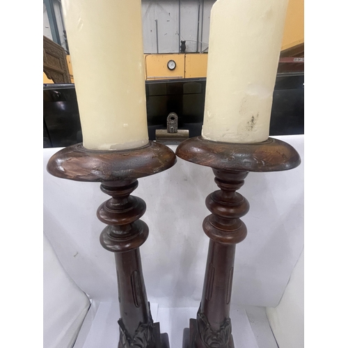 30 - A PAIR OF LARGE GOTHIC PUGIN STYLE CANDLESTICKS, HEIGHT 62CM