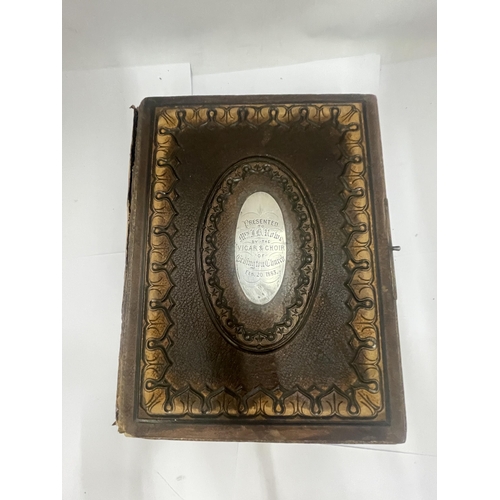 31 - A VICTORIAN PHOTO ALBUM WITH SILVER PLATE ON FRONT PRESENTATION PLAQUE DATED 1883