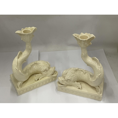 32 - A PAIR OF WEDGWOOD DOLPHIN DESIGN CANDLESTICKS