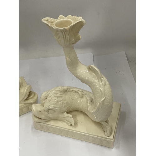 32 - A PAIR OF WEDGWOOD DOLPHIN DESIGN CANDLESTICKS