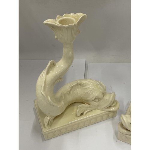 32 - A PAIR OF WEDGWOOD DOLPHIN DESIGN CANDLESTICKS