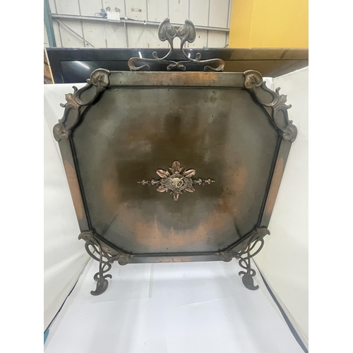 35 - AN ART NOUVEAU METAL FIRE SCREEN