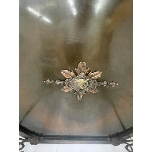 35 - AN ART NOUVEAU METAL FIRE SCREEN