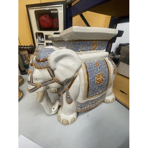 39 - A PAIR OF LARGE CERAMIC ELEPHANT GARDEN SEATS